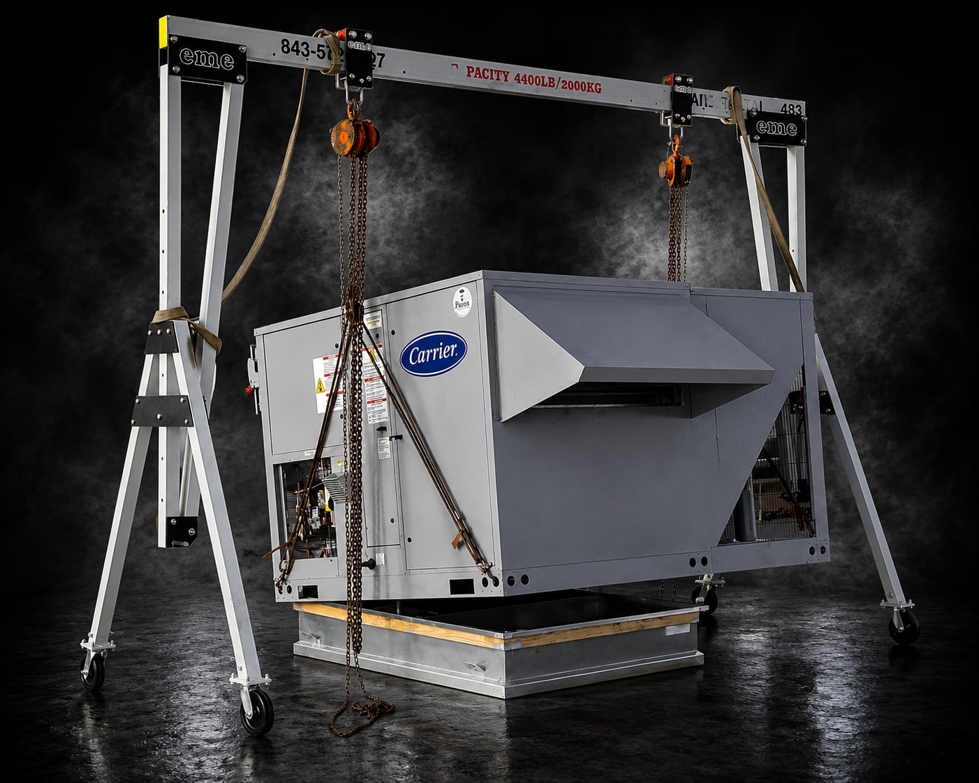 eme 4,400 lb aluminum gantry rigged over a rooftop HVAC unit